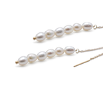 Pearl earring on a white background