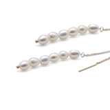 Pearl earring on a white background