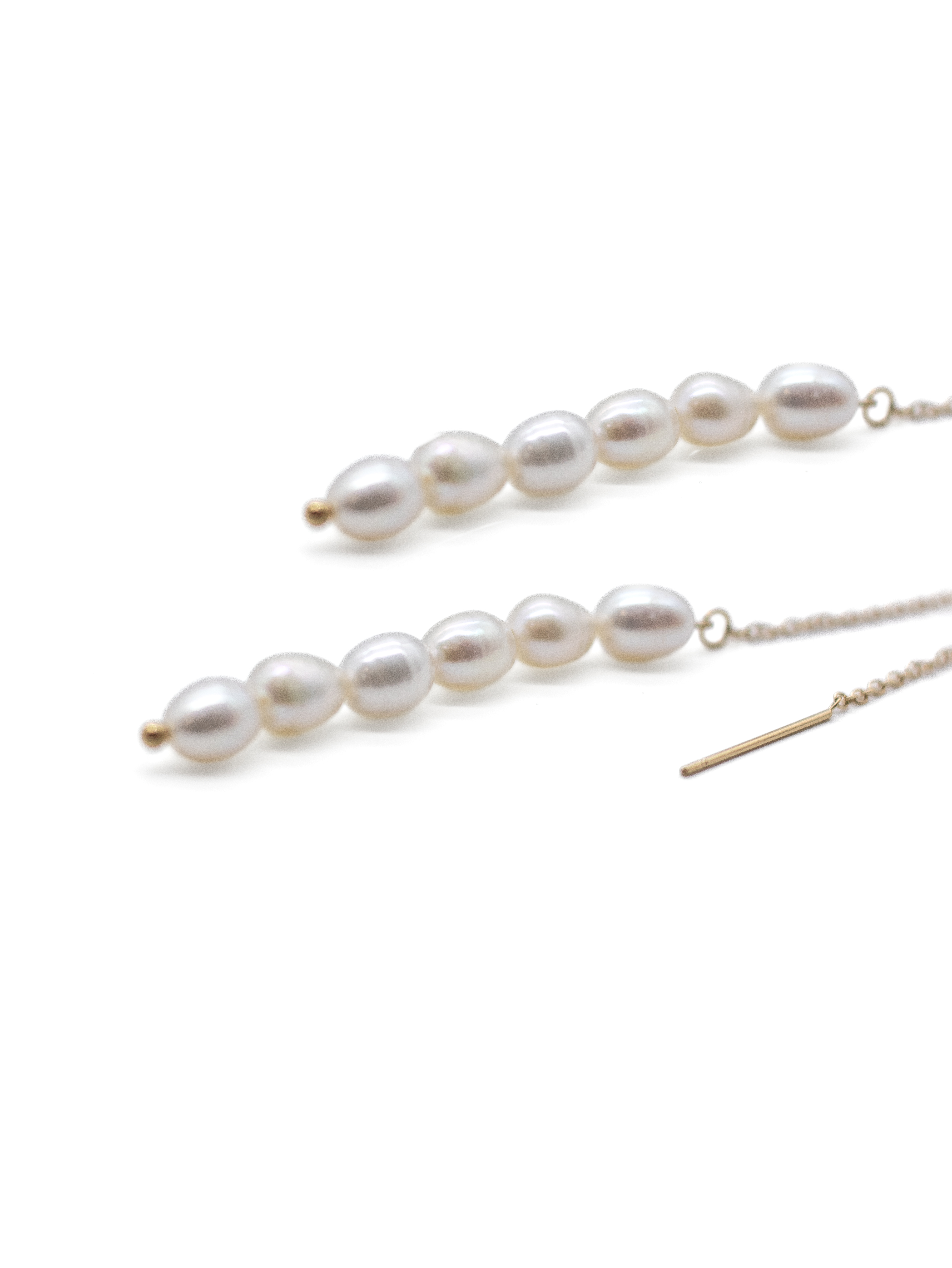 Pearl earring on a white background