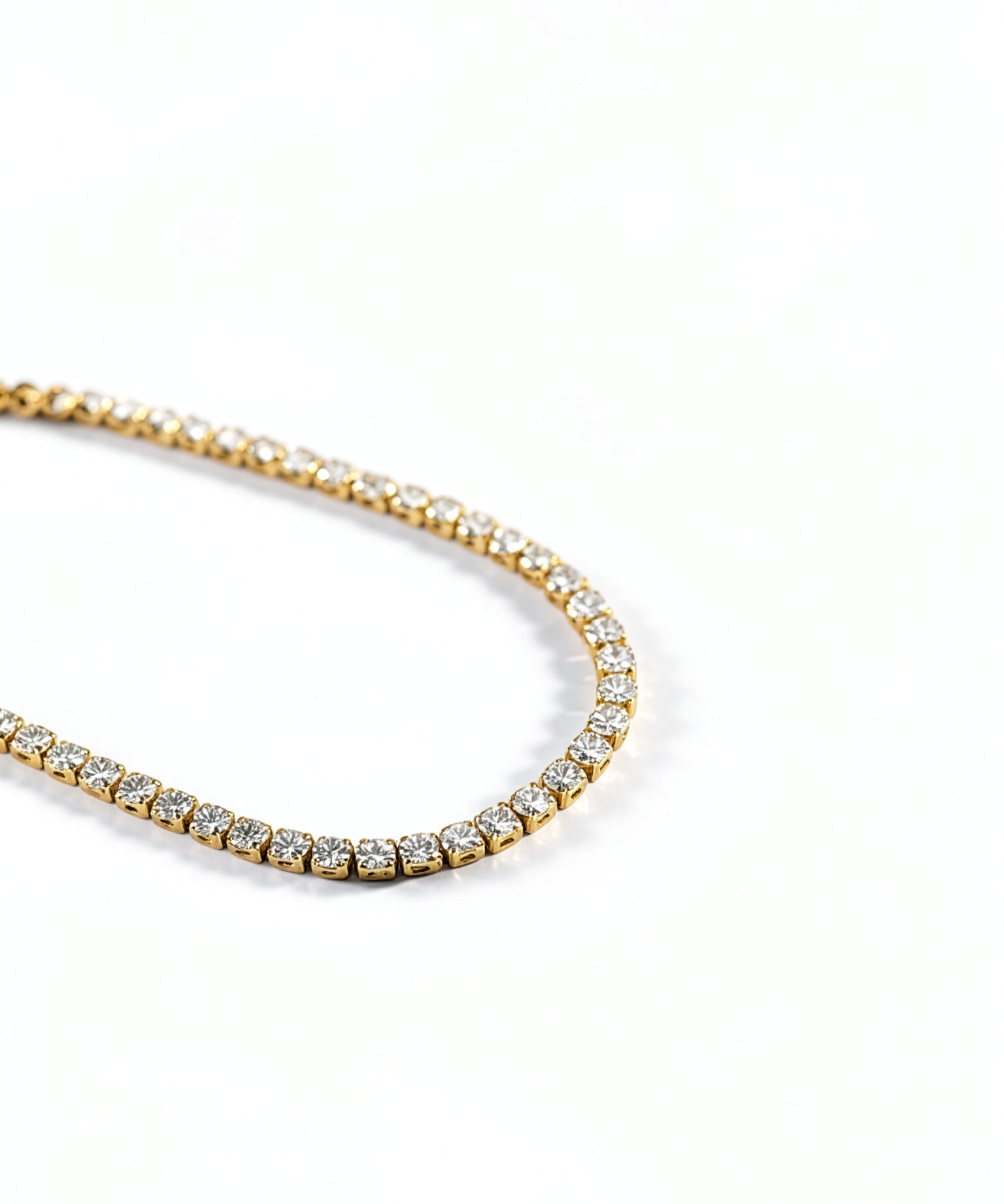 Gold plated cubic zirconia crystal anklet from KIRO UK with a sparkling tennis design for the Anklets Summer Edit and beachproof everyday wear