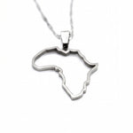 Gold Africa map outline necklace on a chain from KIRO UK celebrating African heritage with a polished pendant design