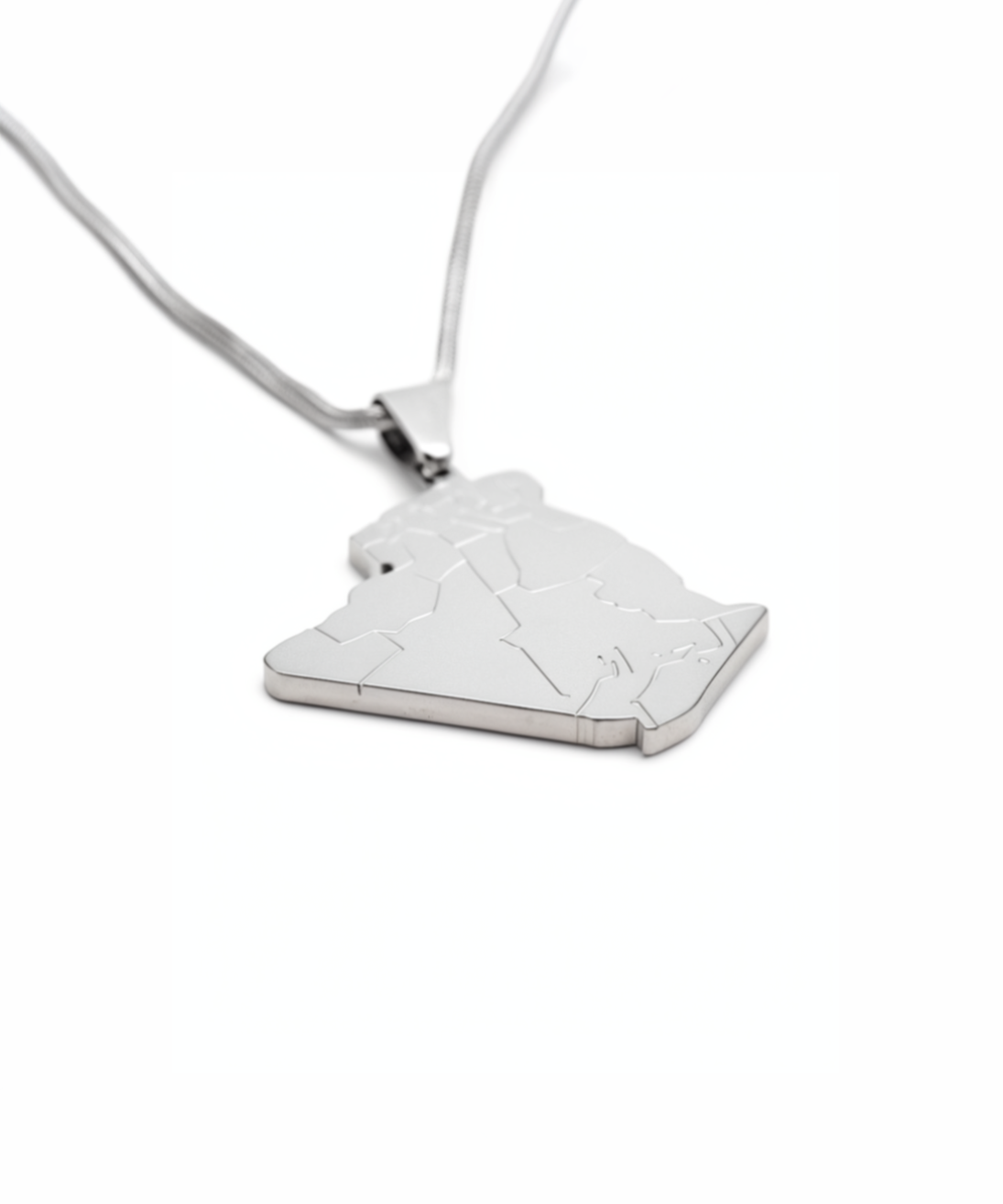 Silver plated Algeria map pendant necklace on a fine chain shown against a white background with a raised outline design for heritage inspired style