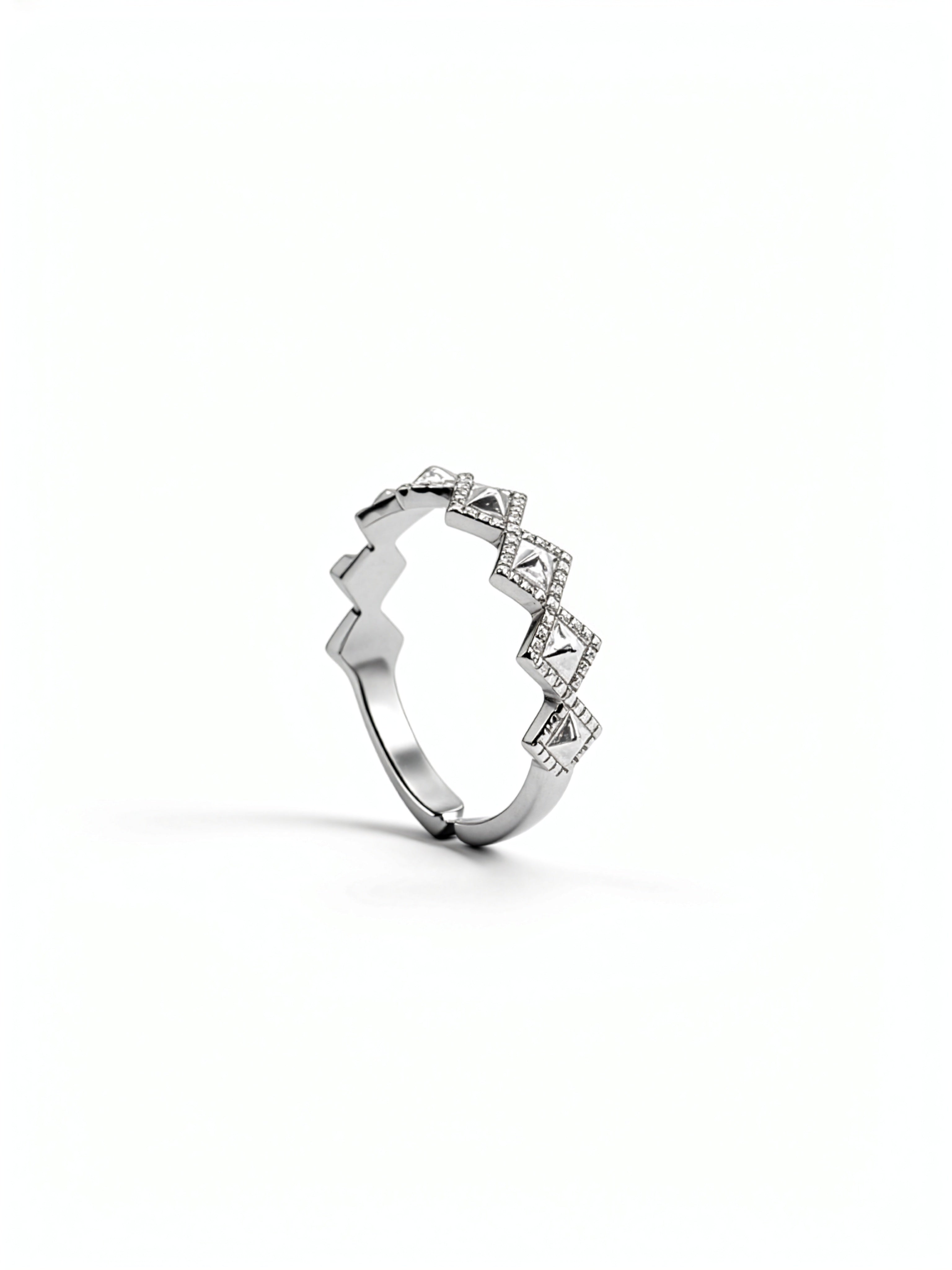 Silver geometric stacking ring with a sparkling diamond design on a white background from KIRO UK
