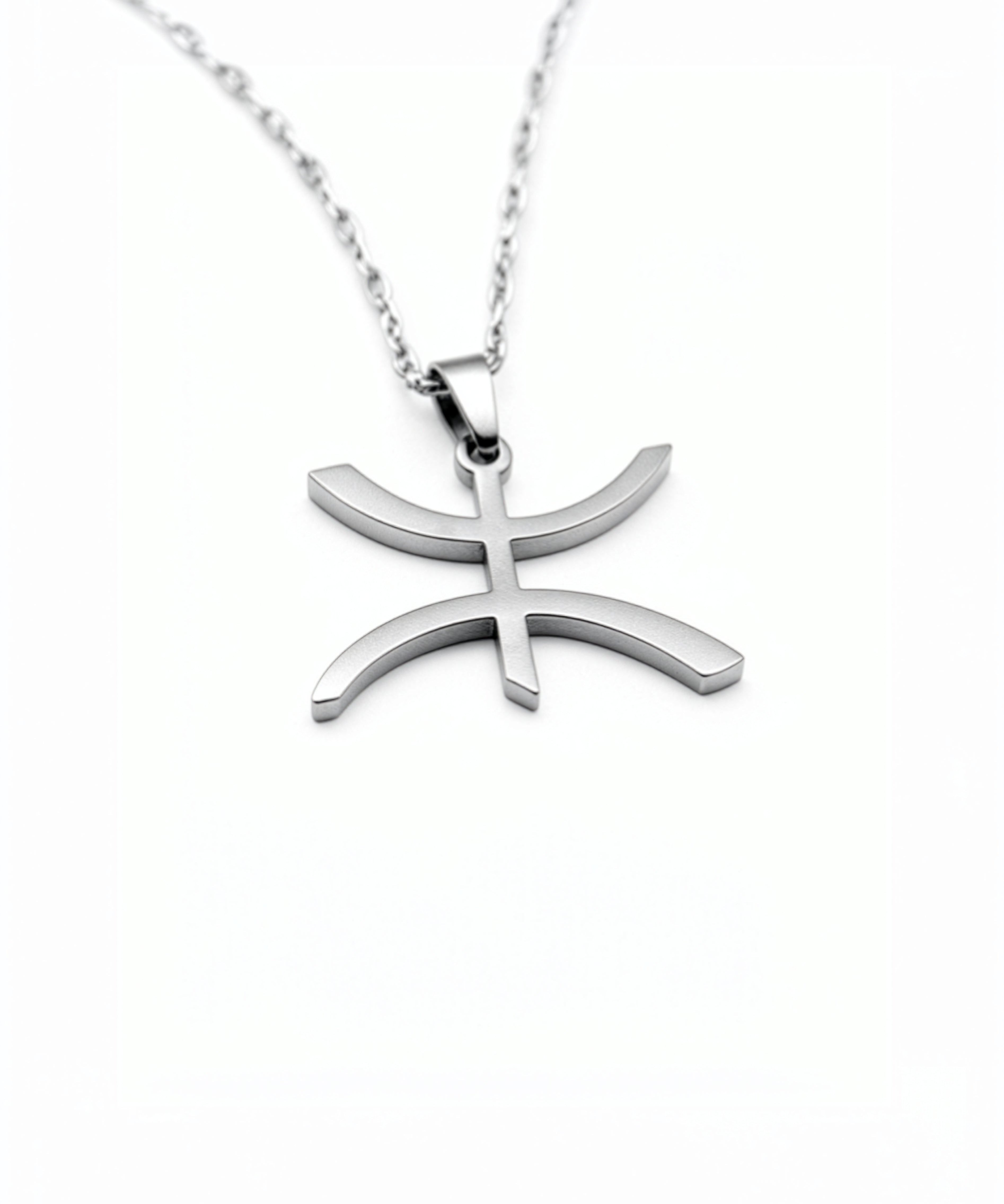Silver plated Amazigh necklace with a curved freedom symbol pendant on a chain, celebrating cultural heritage by KIRO UK