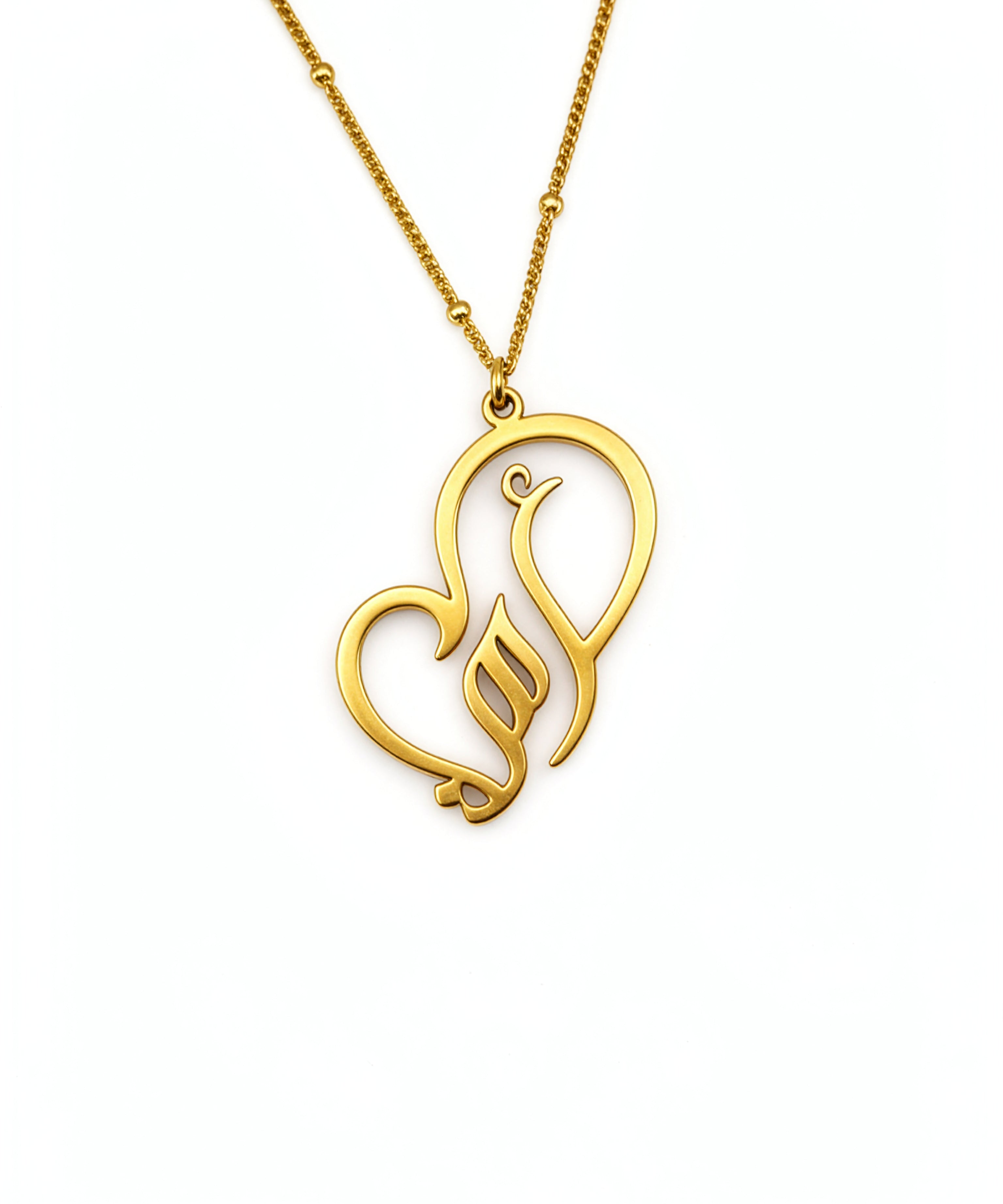 Gold plated Arabic calligraphy necklace with a flowing decorative heart shaped pendant from KIRO UK