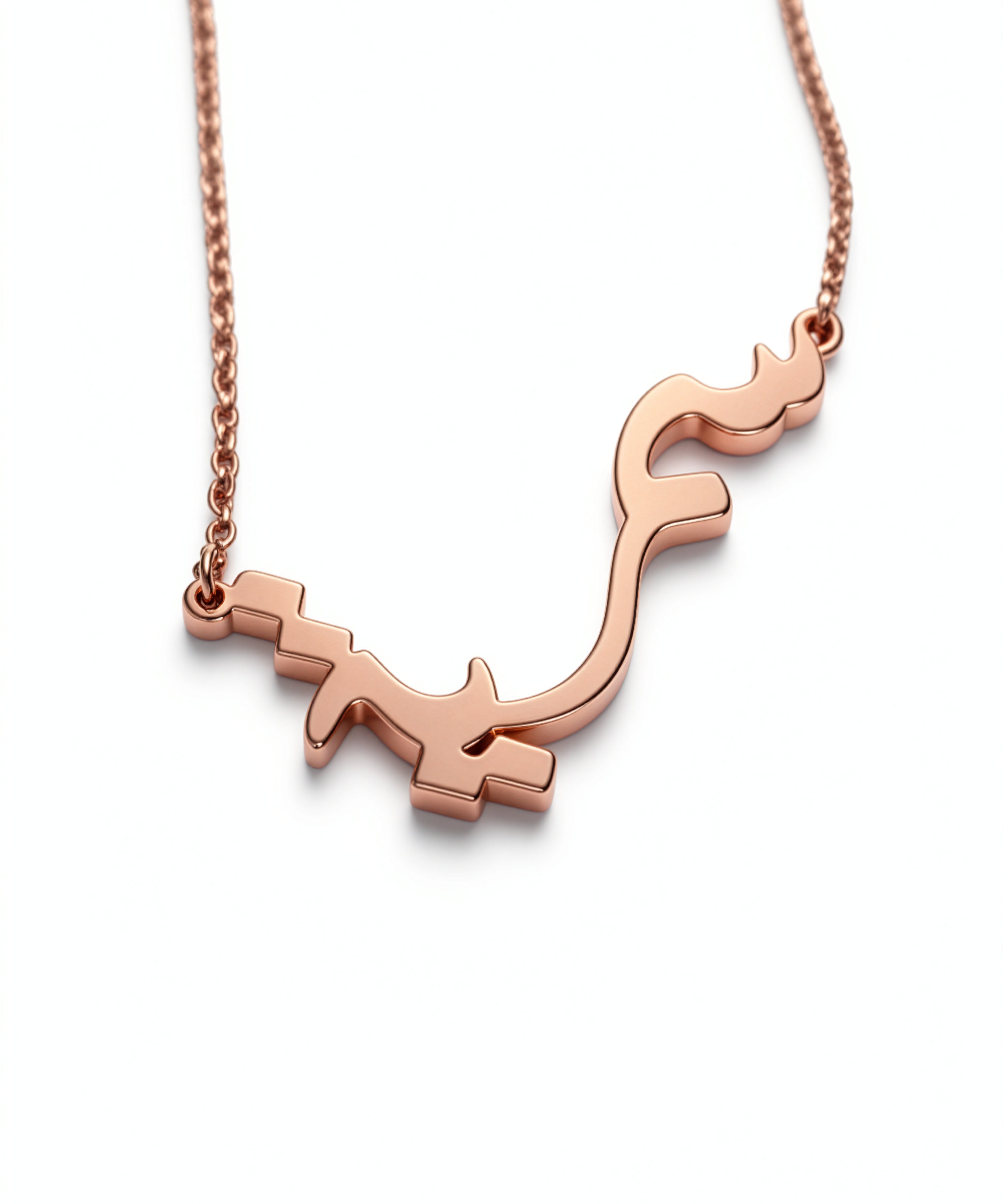 Arabic calligraphy name necklace with a polished rose gold plated finish on a delicate chain KIRO UK personalised jewellery statement piece