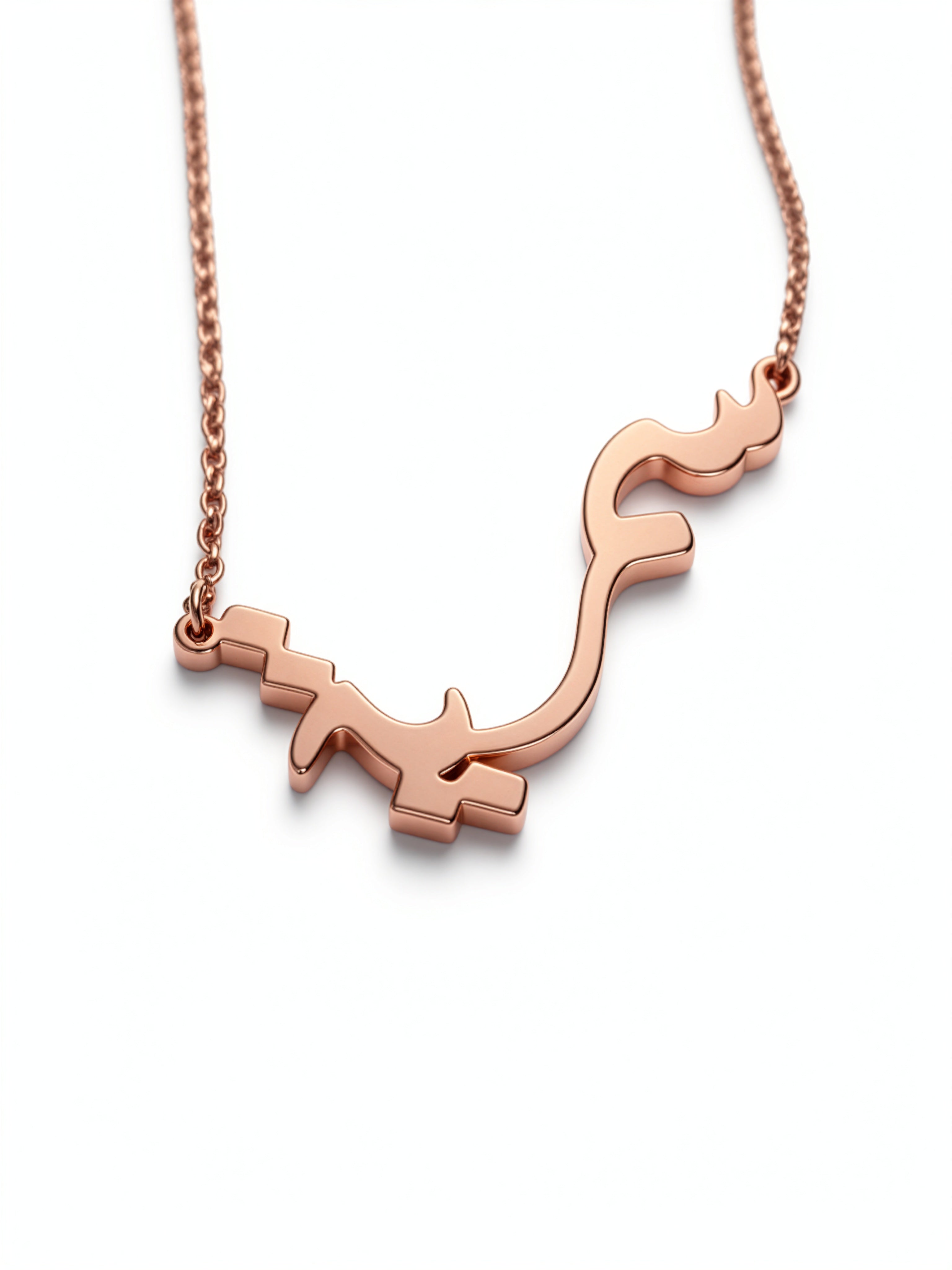 Arabic calligraphy name necklace with a polished rose gold plated finish on a delicate chain KIRO UK personalised jewellery statement piece