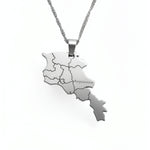 Silver plated map of Armenia pendant on a chain with Armenian script engraving across the front in a detailed geographic design