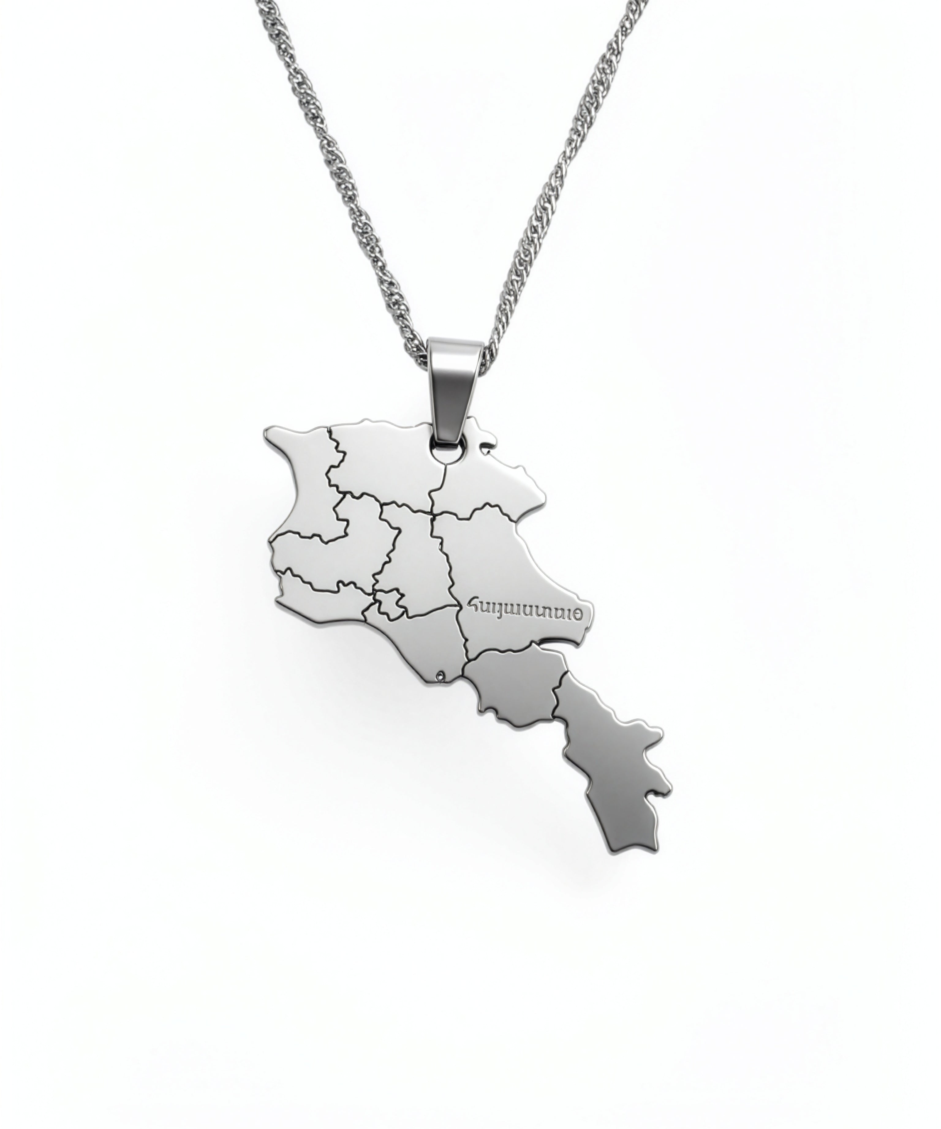 Silver plated map of Armenia pendant on a chain with Armenian script engraving across the front in a detailed geographic design