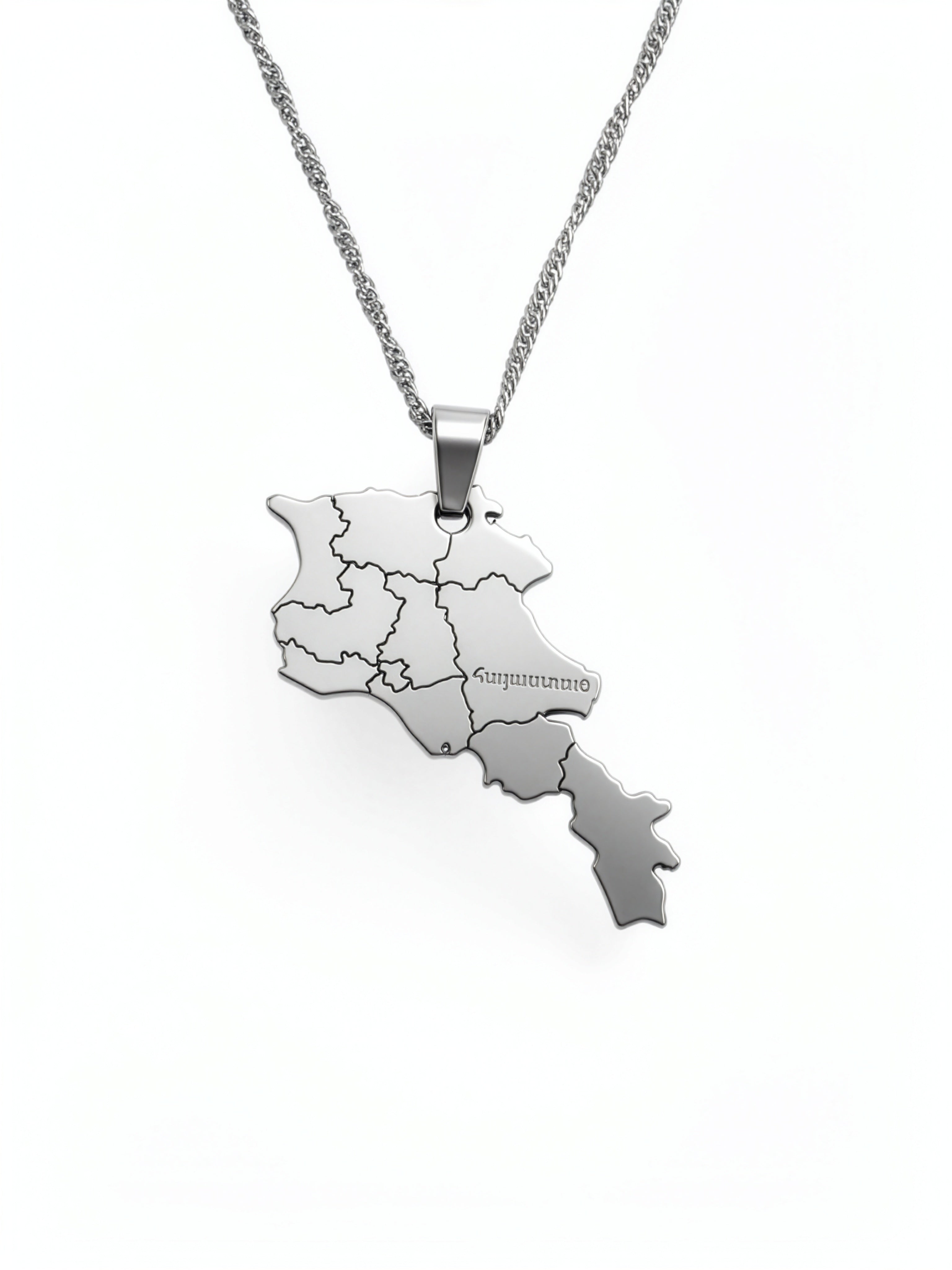 Silver plated map of Armenia pendant on a chain with Armenian script engraving across the front in a detailed geographic design