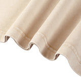 Close up of beige cotton T shirt fabric with a softly curved stitched hem from kiro Clothing