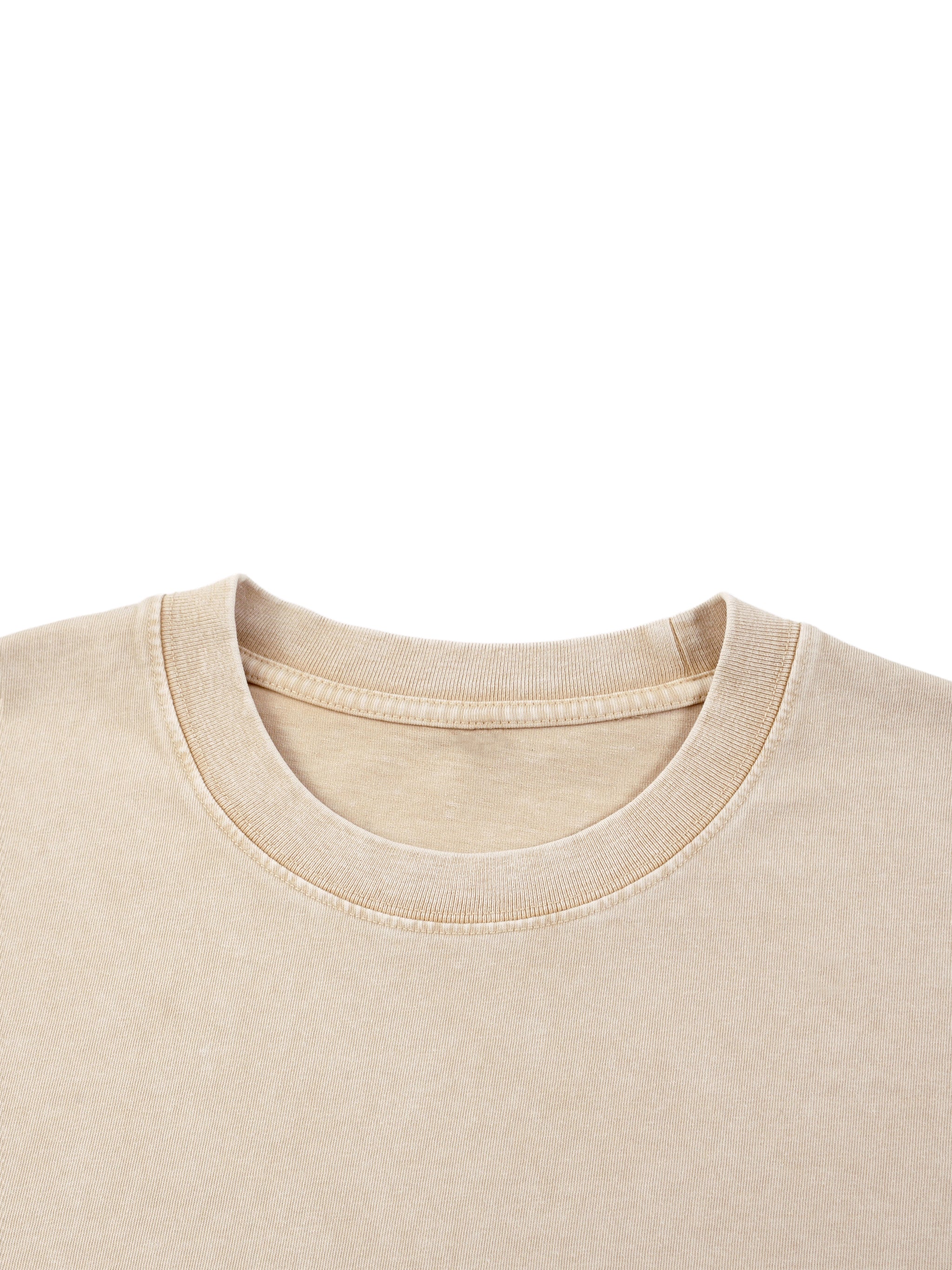 kiro Clothing beige cotton T shirt with a classic ribbed crew neckline and soft mineral wash finish shown in close up