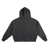 Black oversized cotton hoodie shown from the back with an extra large hood and ribbed cuffs by KIRO from the Clothing collection