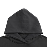 Black oversized cotton hoodie with an extra large hood shown close up on a white background from KIRO Clothing