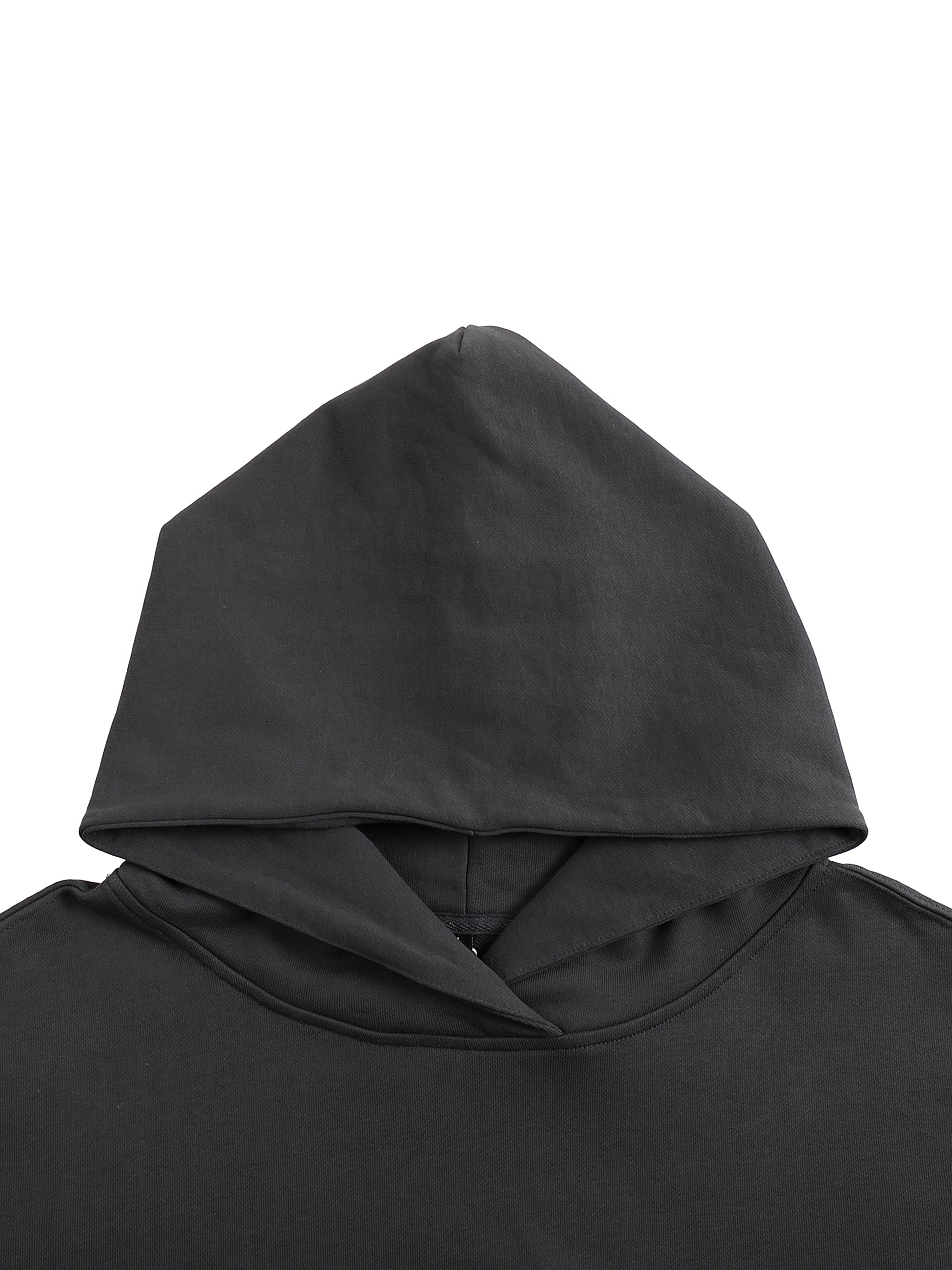 Black oversized cotton hoodie with an extra large hood shown close up on a white background from KIRO Clothing