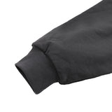 Black oversized cotton hoodie sleeve with a ribbed cuff from KIRO Clothing collection against a white background