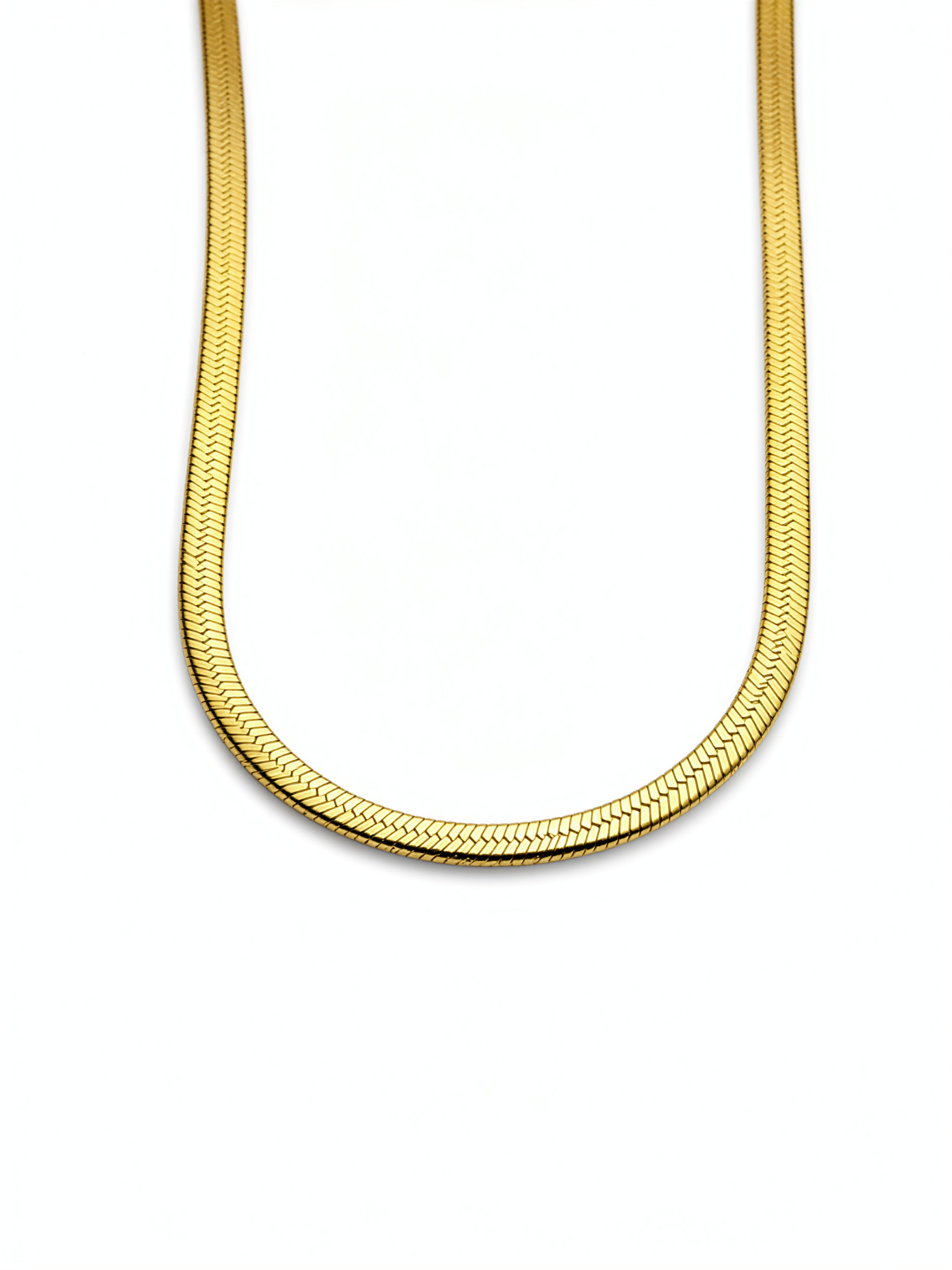Gold plated herringbone statement necklace on a white background with a smooth flat weave inspired by Egyptian collar jewellery from KIRO UK