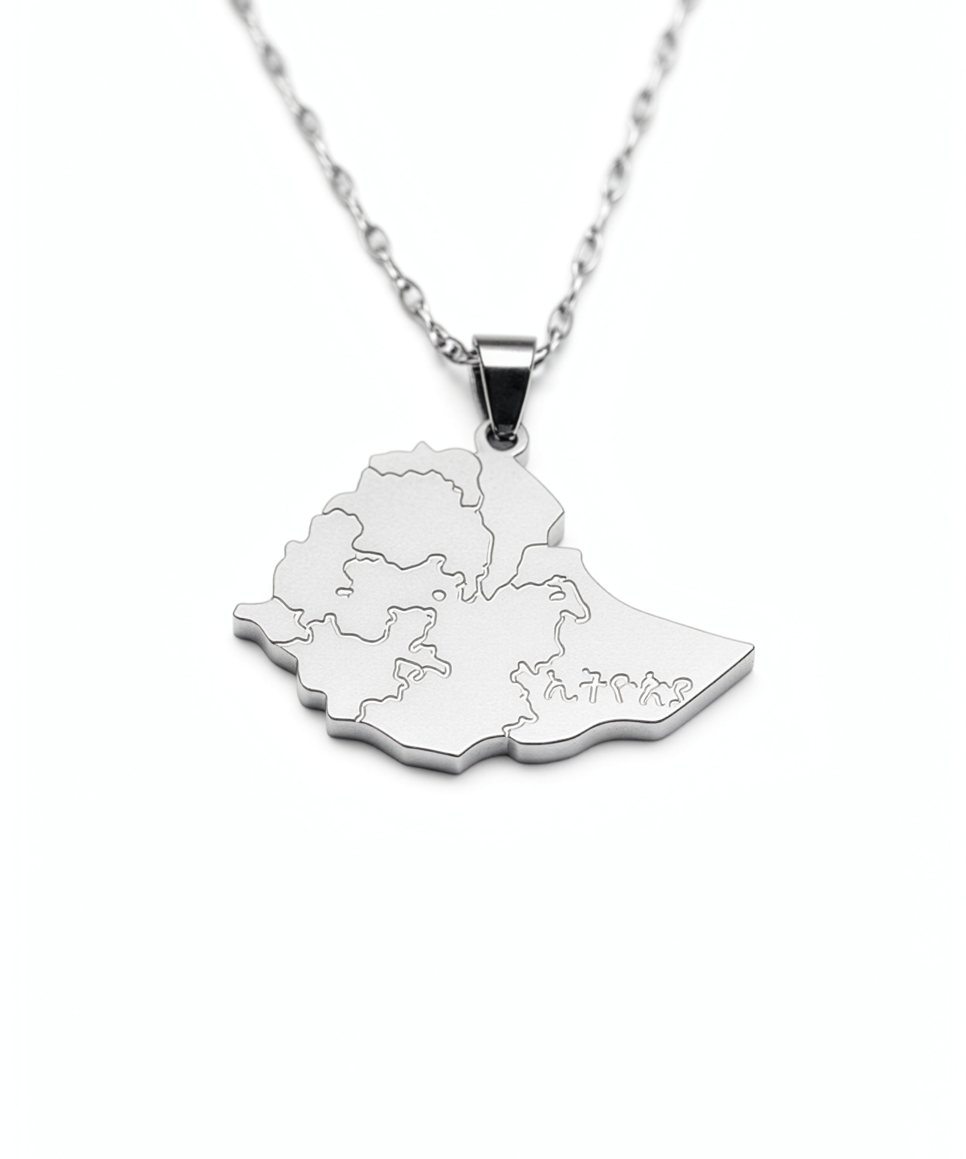 Silver plated Ethiopia map necklace pendant on a chain with detailed regional outlines and a raised bail from KIRO UK