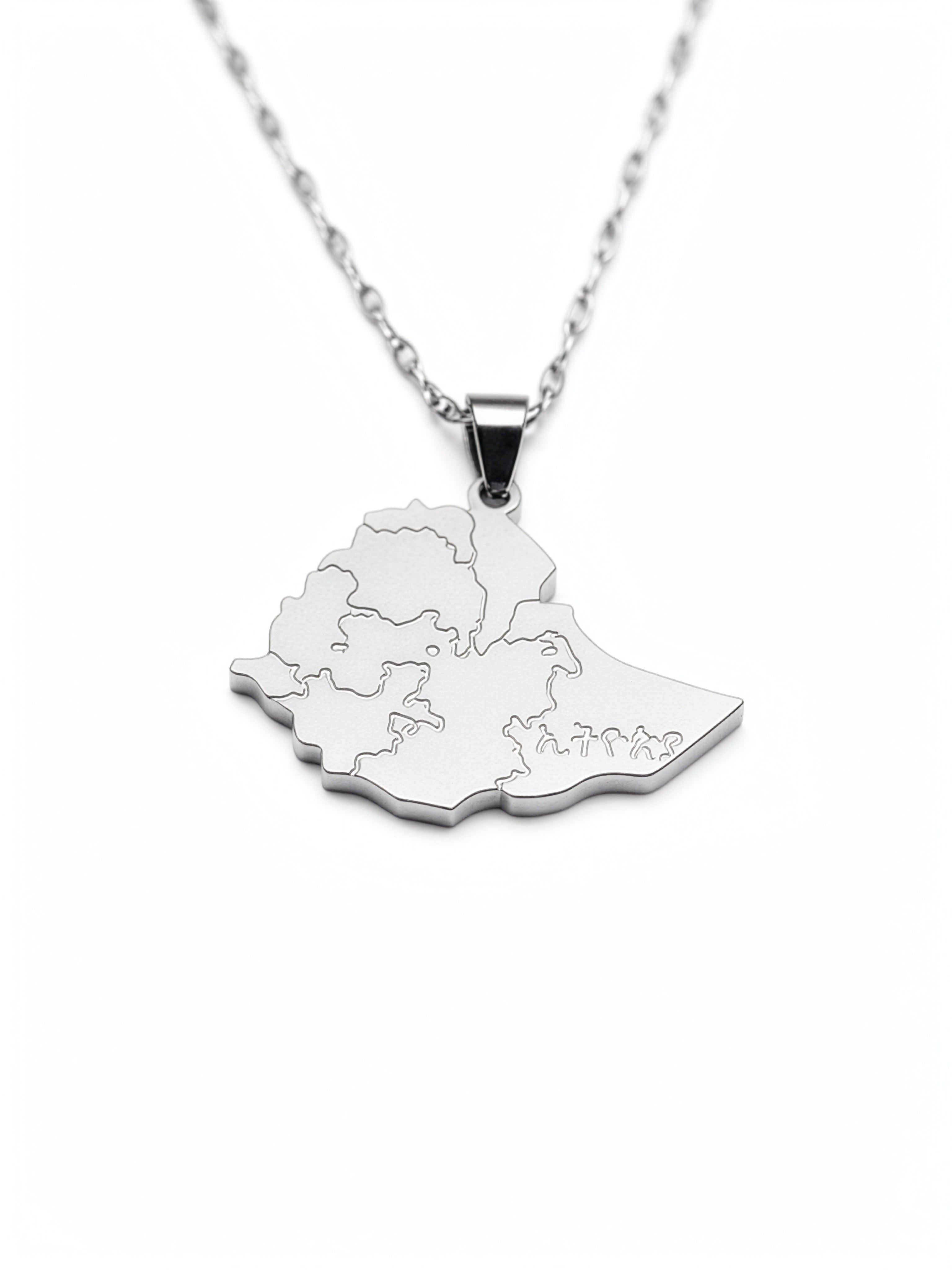Silver plated Ethiopia map necklace pendant on a chain with detailed regional outlines and a raised bail from KIRO UK