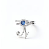 KIRO UK Eye of Horus ring in silver with a central sapphire and cubic zirconia details forming a geometric Egyptian symbol