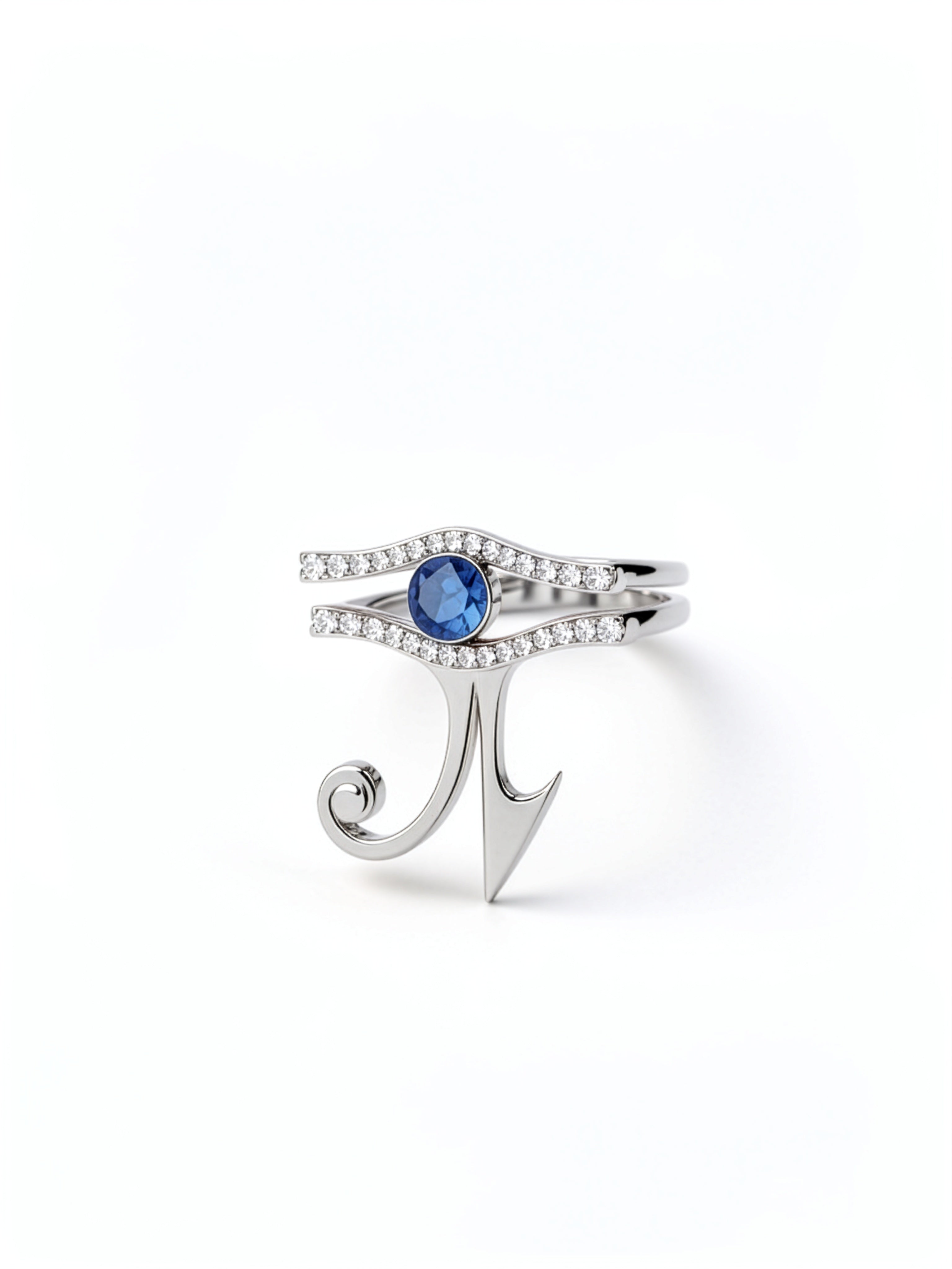 KIRO UK Eye of Horus ring in silver with a central sapphire and cubic zirconia details forming a geometric Egyptian symbol