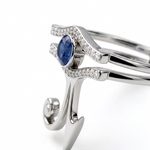 Silver Eye of Horus ring with a deep blue sapphire centre and sparkling cubic zirconia detailing by KIRO UK Egyptian Collection