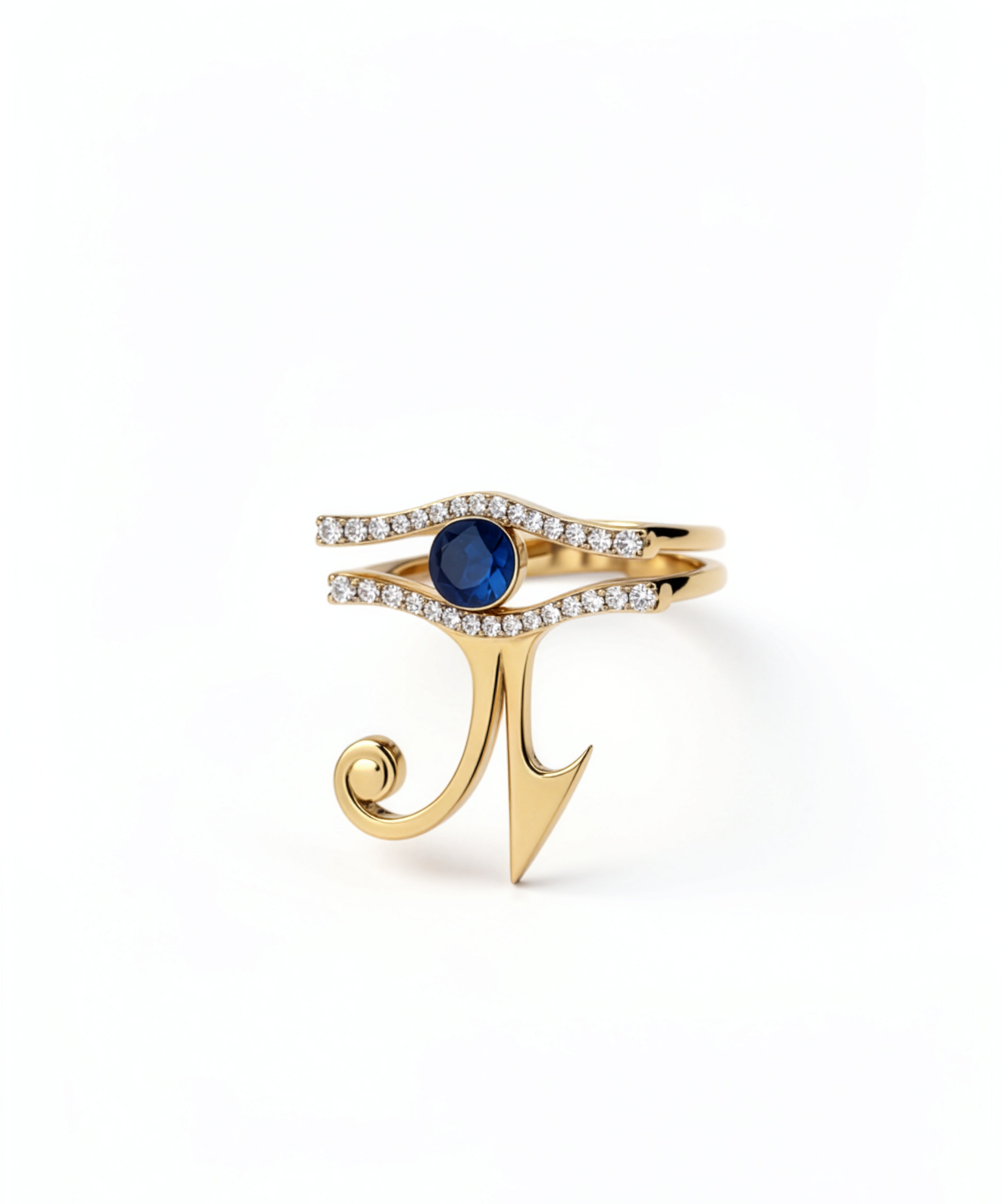 KIRO UK Eye of Horus ring with two stackable gold vermeil bands lined with cubic zirconia and a central blue sapphire on white background