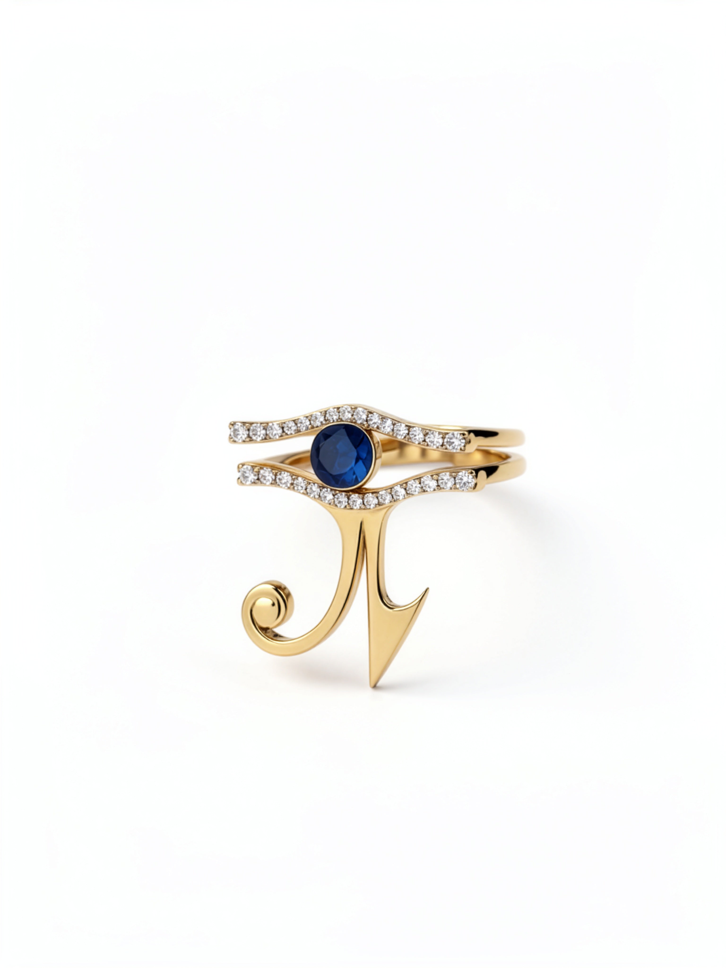 KIRO UK Eye of Horus ring with two stackable gold vermeil bands lined with cubic zirconia and a central blue sapphire on white background