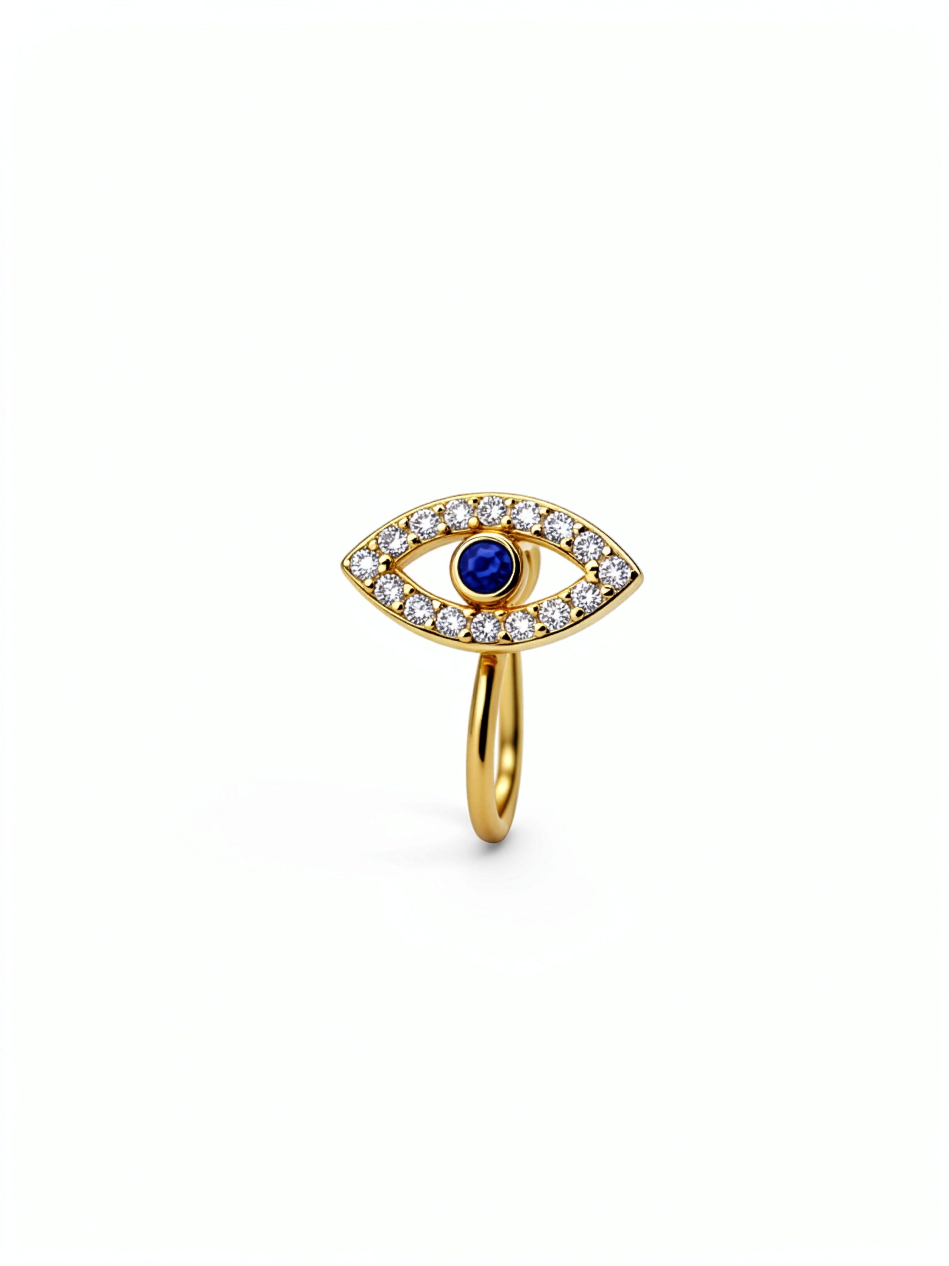 Gold faux nose cuff featuring an evil eye design with a blue sapphire centerpiece and surrounding cubic zirconia gems on a white background