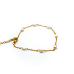 kiro freshwater pearl anklet featuring 7 pearls on an 18k gold chain.