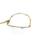 kiro freshwater pearl anklet featuring 7 pearls on an 18k gold chain.