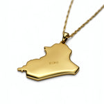 Gold plated Iraq map pendant necklace with KIRO engraving on the reverse and a delicate chain from KIRO UK