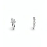 Two sterling silver nose rings with sparkling cubic zirconia details, including a floral cluster design and a vertical row of round stones on a white background