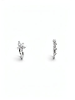 Two sterling silver nose rings with sparkling cubic zirconia details, including a floral cluster design and a vertical row of round stones on a white background