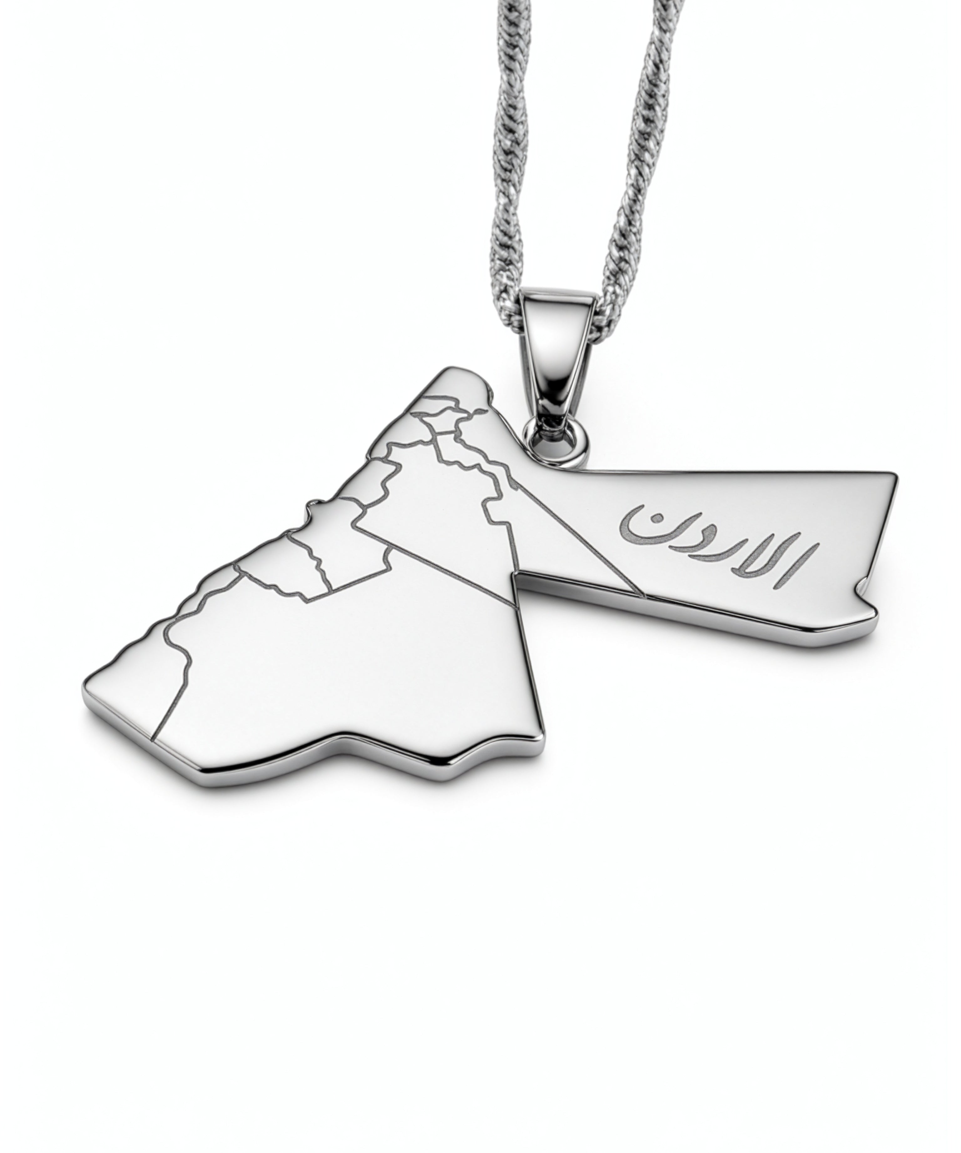 Silver plated Jordan map necklace with Arabic lettering on the pendant, hanging from a textured chain by KIRO UK