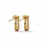 18K gold plated stainless steel beaded drop earrings by KIRO UK from the Earrings and Everyday Essentials collection