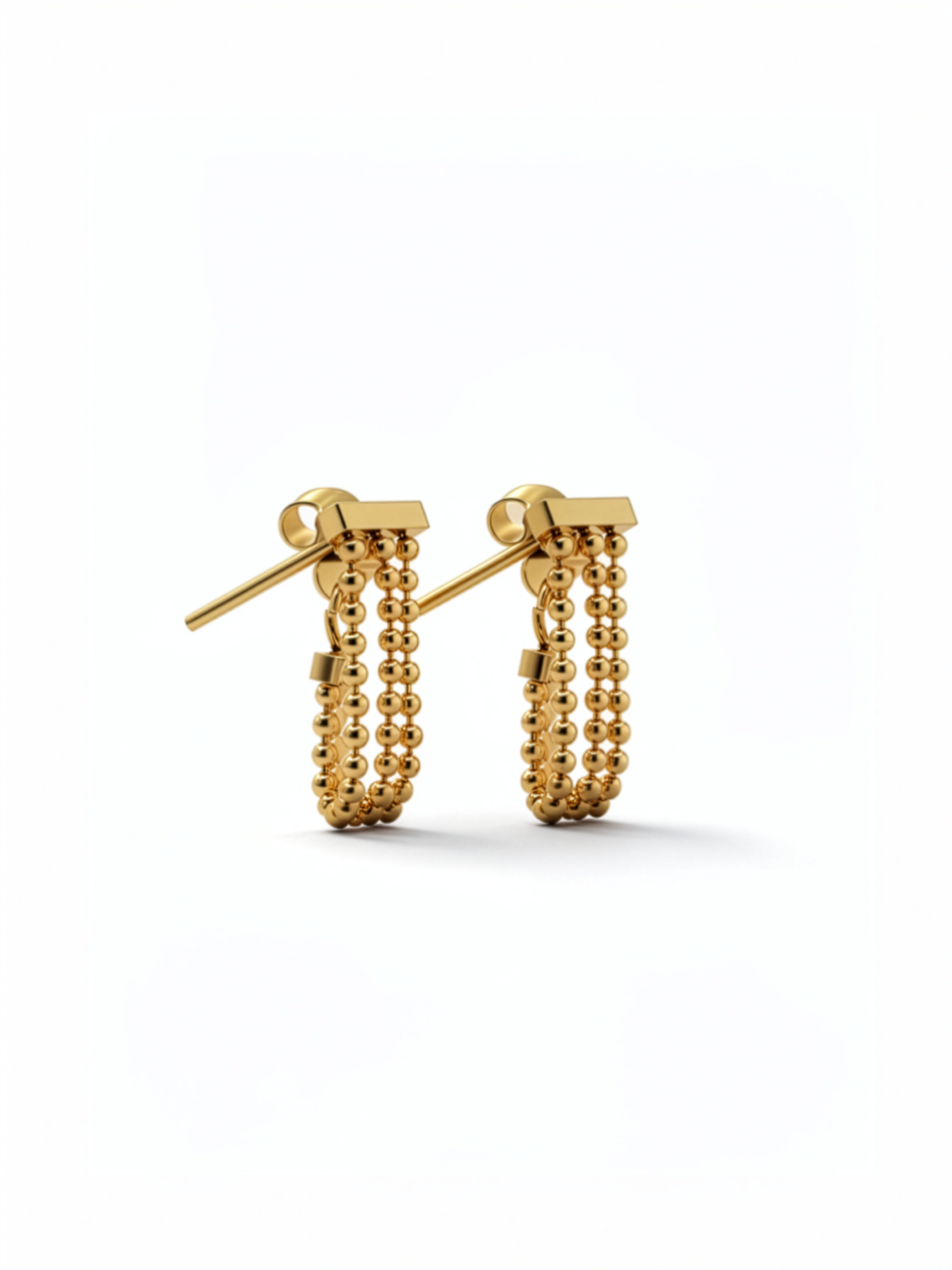 18K gold plated stainless steel beaded drop earrings by KIRO UK from the Earrings and Everyday Essentials collection