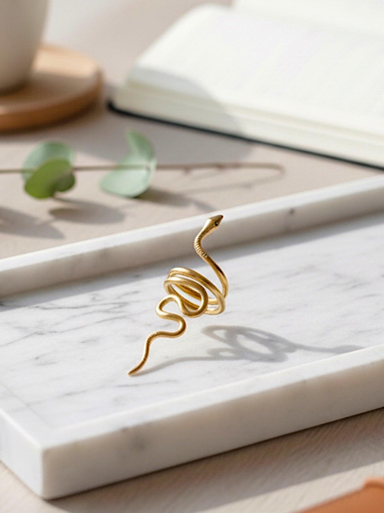 KIRO gold plated snake ring with intricate detailing, a statement accessory for elegant style. Resizable.