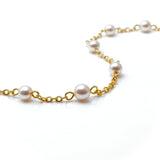 kiro freshwater pearl anklet featuring 7 pearls on an 18k gold chain.
