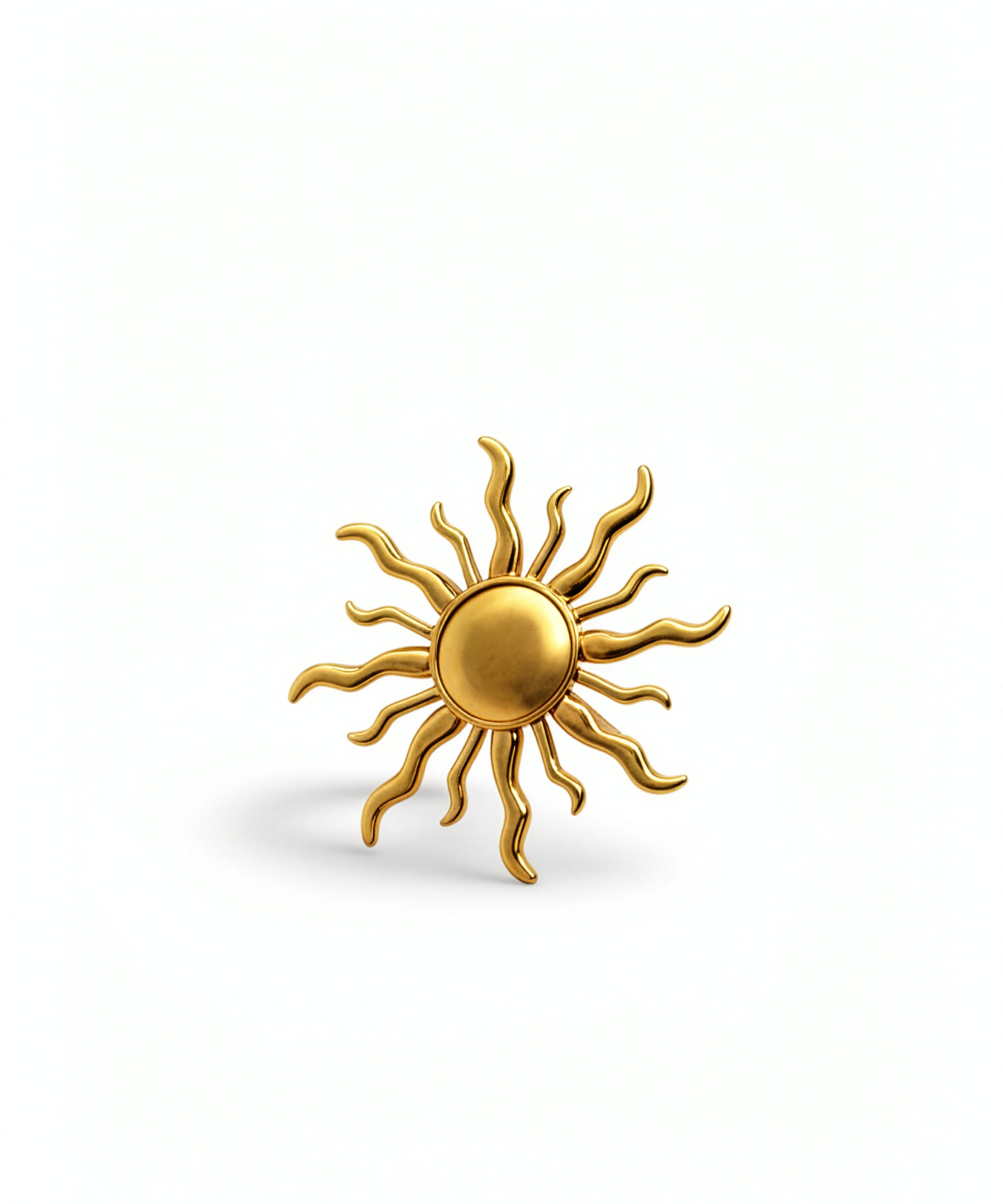 KIRO gold ring in the shape of a sun shining with several large rays and small rays. The ring is adjustable to size.