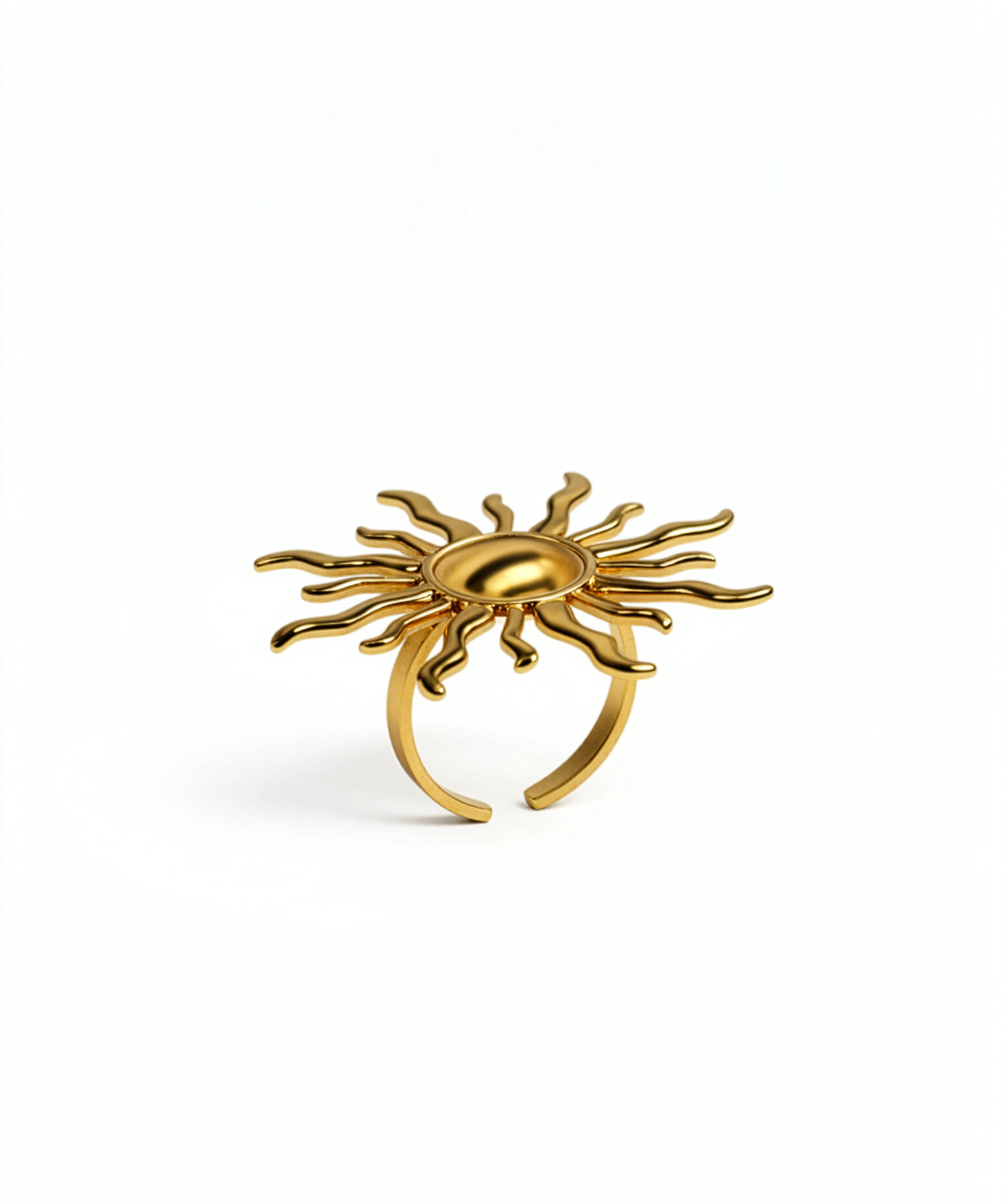 KIRO gold ring in the shape of a sun shining with several large rays and small rays. The ring is adjustable to size.