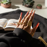 KIRO gold plated Serpent XL ring with intricate snake design, adjustable size, statement accessory.