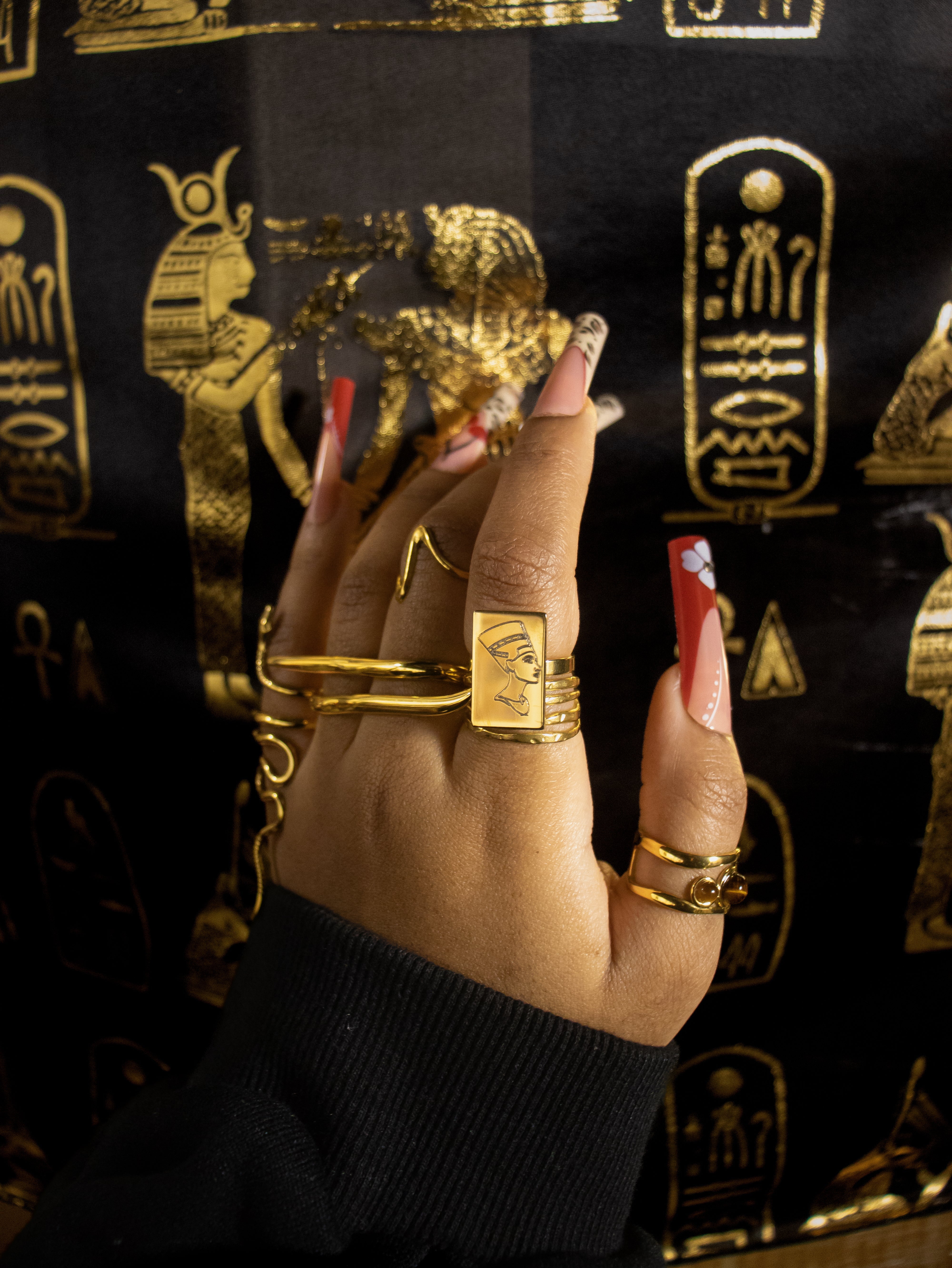 18k Gold plated KIRO meroe two finger bar ring, stacked with other rings on different fingers.