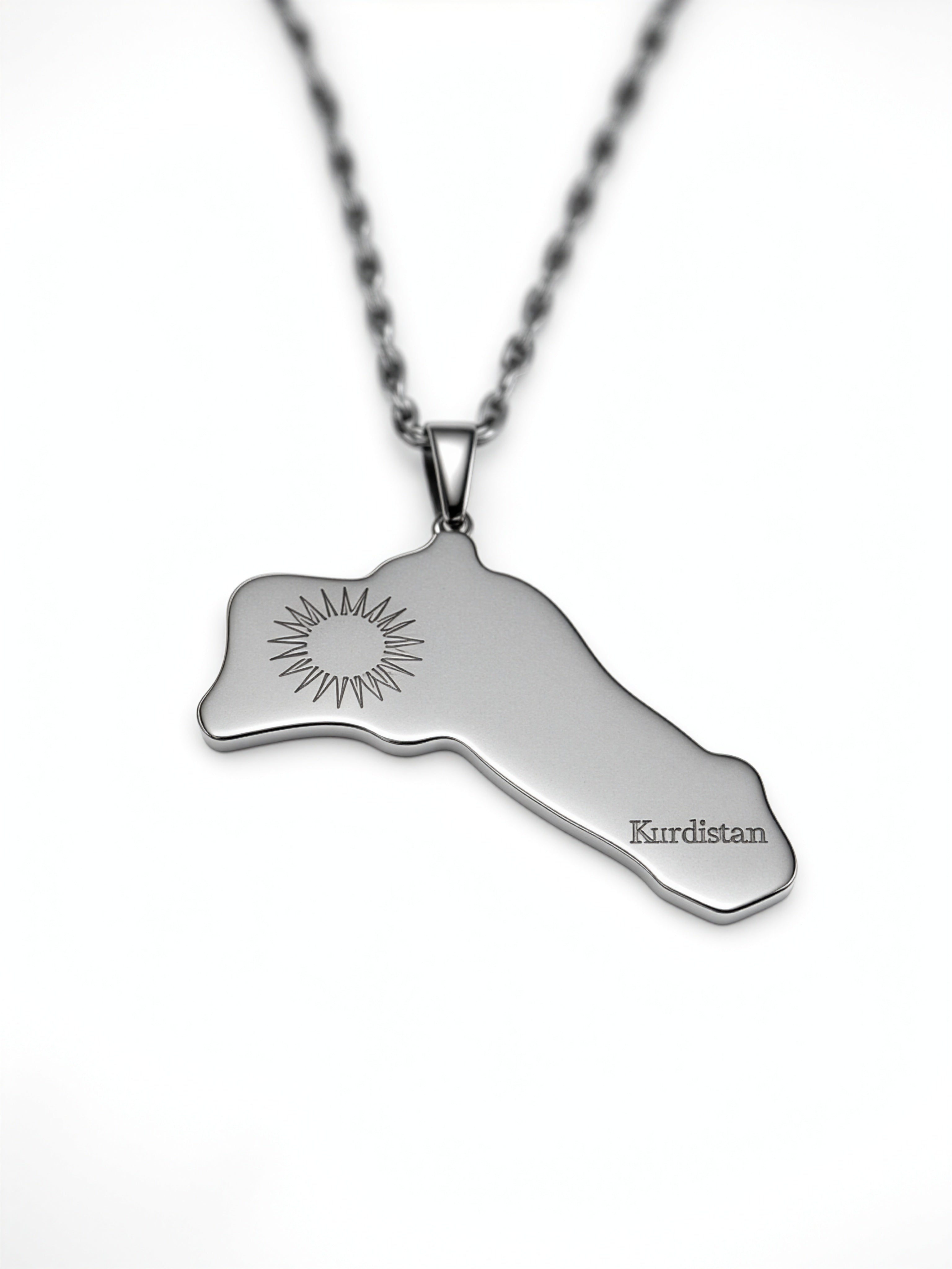 Silver plated Kurdistan map necklace with engraved sun emblem and Kurdistan lettering on a stainless steel pendant by KIRO UK