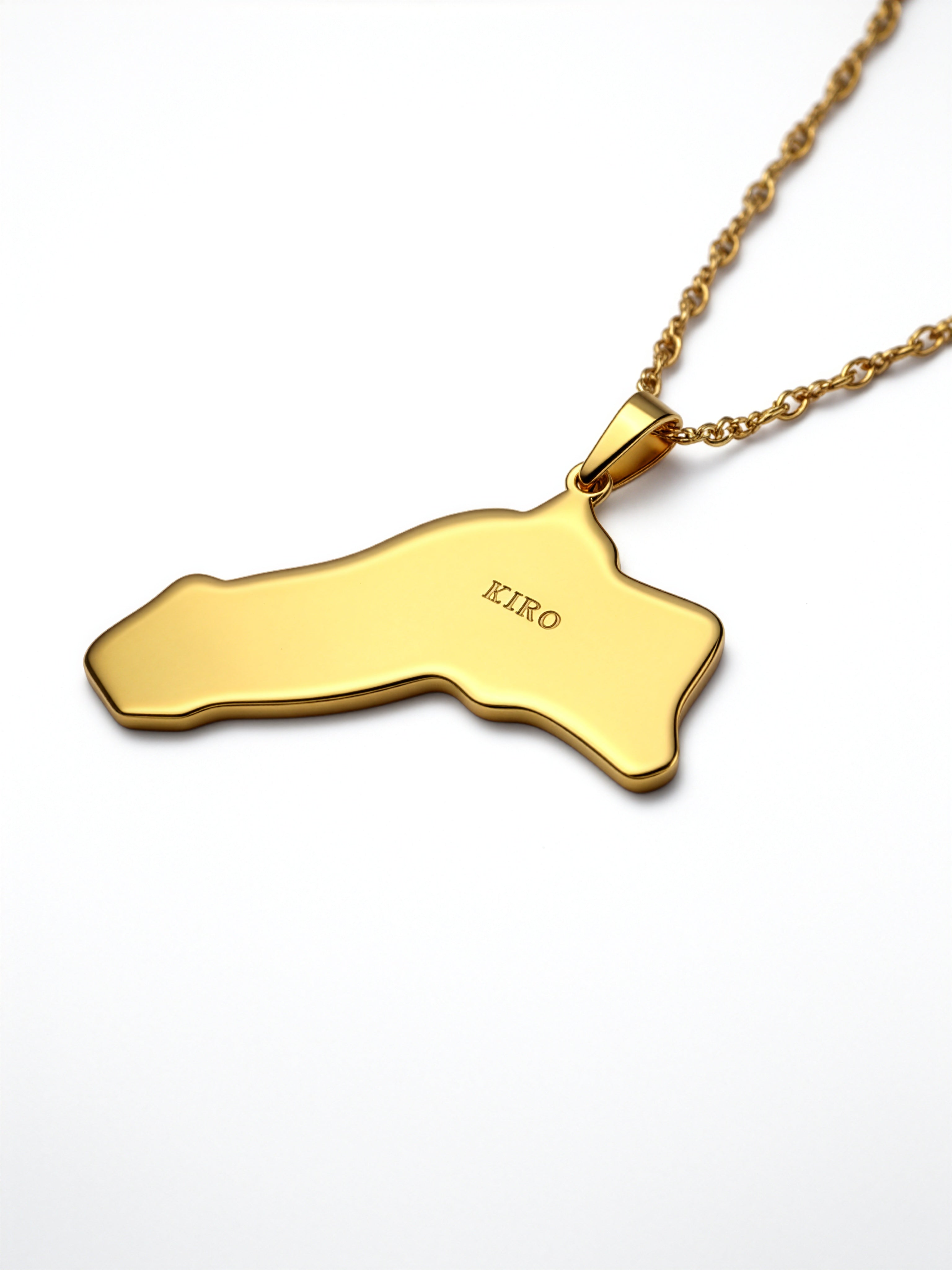 Gold plated Kurdistan map pendant necklace with KIRO UK engraving on a linked chain shown against a white background