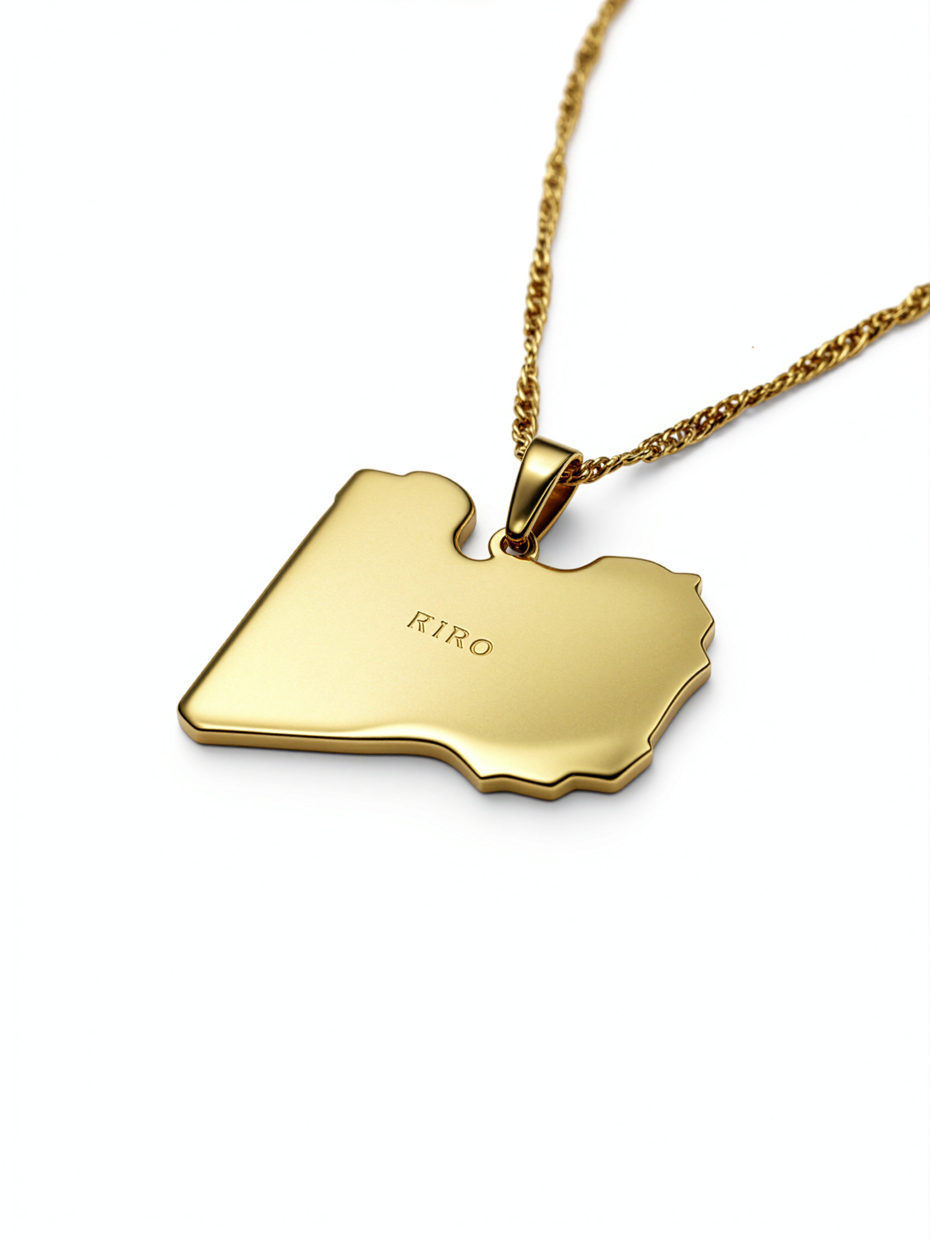 18K gold plated Libya map necklace by KIRO UK with a polished pendant engraved KIRO on a chain celebrating Libyan heritage
