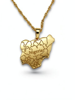 18k Gold Plated necklace of the map of Nigeria. "Nigeria" is written in the middle with all the cities engraved. the pendant hangs on a water wave chain.