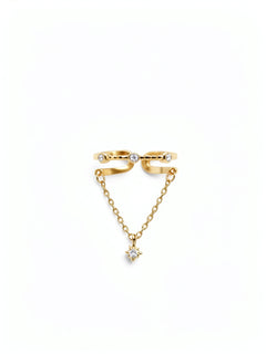 KIRO UK gold vermeil adjustable ring with a delicate chain and cubic zirconia star charm shown on a white background