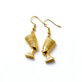 Gold plated Egyptian Queen Nefertiti drop earrings with detailed sculpted face designs on hooks by KIRO UK