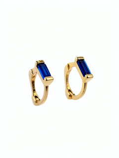 Gold vermeil huggie earrings with blue sapphire accents from KIRO UK featured in the Earrings Winter Edit and Gemstone Edit collections